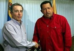 Uribe, murderer of the workers and the poor people of Colombia, get out!